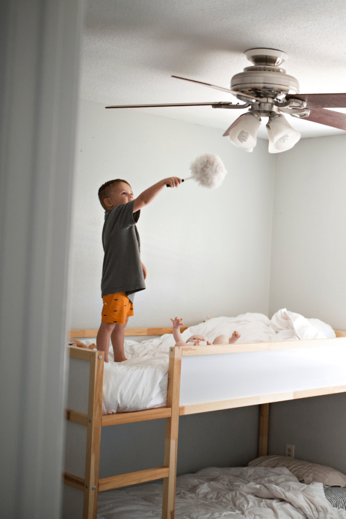 funny picture of child helping clean